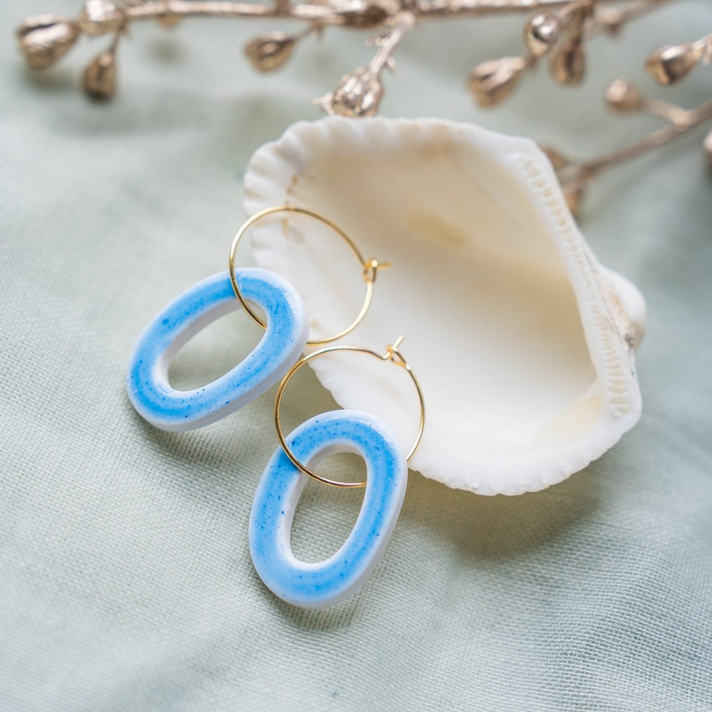 Hollow Oval Blue Faux Ceramic Earrings